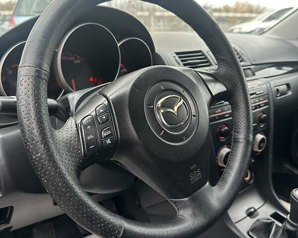 Сірий Мазда 3, об'ємом двигуна 1.6 л та пробігом 216 тис. км за 4800 $, фото 4 на Automoto.ua