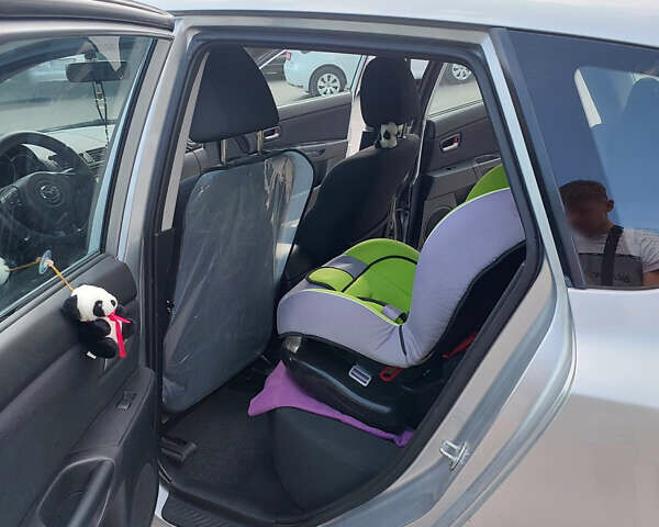 Серый Мазда 3, объемом двигателя 1.6 л и пробегом 211 тыс. км за 4750 $, фото 11 на Automoto.ua