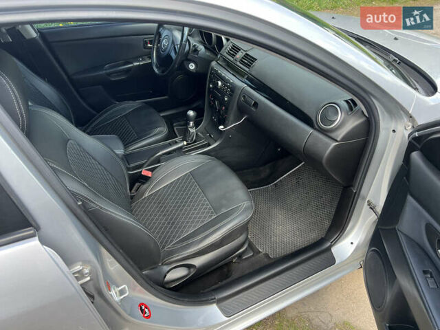 Сірий Мазда 3, об'ємом двигуна 1.6 л та пробігом 232 тис. км за 4200 $, фото 13 на Automoto.ua