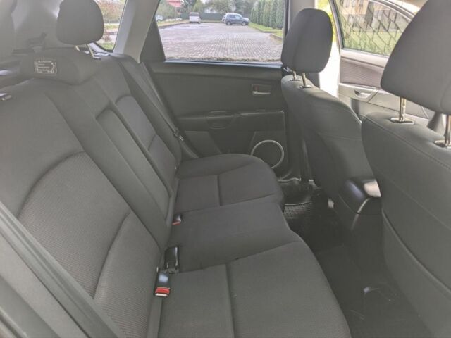 Серый Мазда 3, объемом двигателя 1.6 л и пробегом 217 тыс. км за 5499 $, фото 7 на Automoto.ua