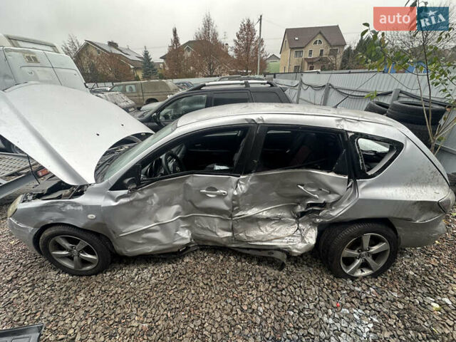 Серый Мазда 3, объемом двигателя 1.6 л и пробегом 200 тыс. км за 1750 $, фото 8 на Automoto.ua