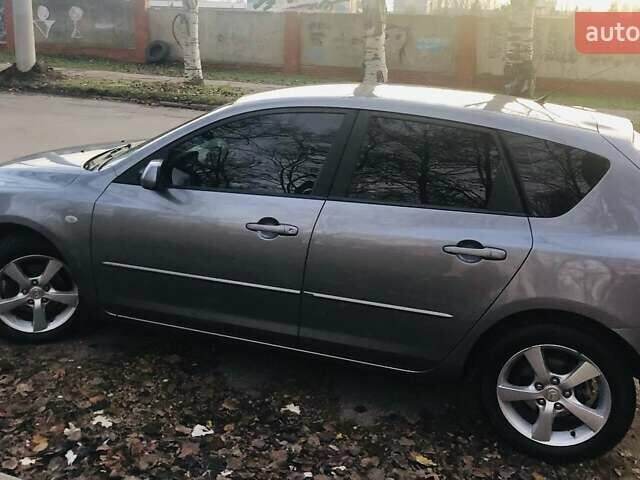 Серый Мазда 3, объемом двигателя 1.56 л и пробегом 179 тыс. км за 5450 $, фото 6 на Automoto.ua