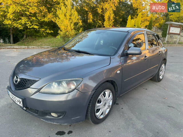 Серый Мазда 3, объемом двигателя 2 л и пробегом 300 тыс. км за 6500 $, фото 2 на Automoto.ua