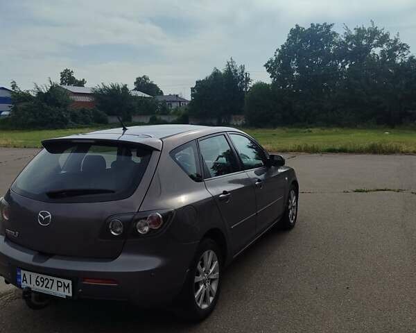 Серый Мазда 3, объемом двигателя 1.6 л и пробегом 358 тыс. км за 4100 $, фото 4 на Automoto.ua