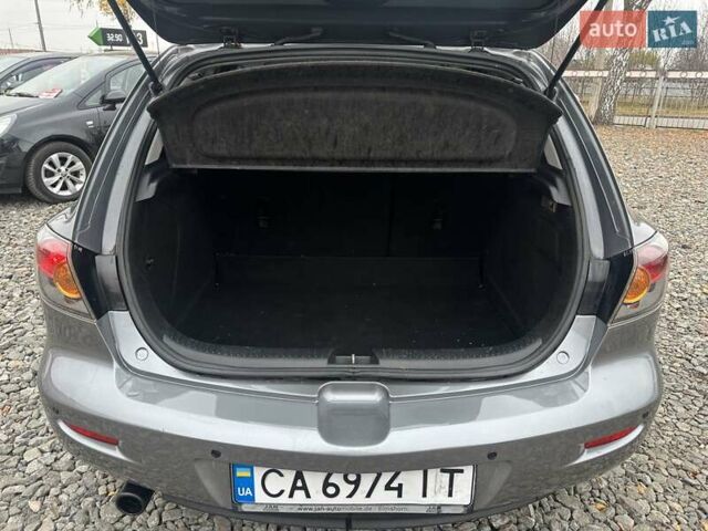 Сірий Мазда 3, об'ємом двигуна 1.6 л та пробігом 216 тис. км за 4800 $, фото 18 на Automoto.ua