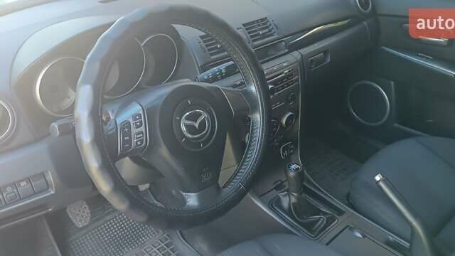 Серый Мазда 3, объемом двигателя 1.6 л и пробегом 230 тыс. км за 4150 $, фото 22 на Automoto.ua