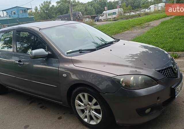 Серый Мазда 3, объемом двигателя 1.56 л и пробегом 380 тыс. км за 3600 $, фото 7 на Automoto.ua