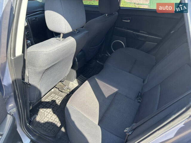 Сірий Мазда 3, об'ємом двигуна 1.6 л та пробігом 233 тис. км за 6000 $, фото 13 на Automoto.ua