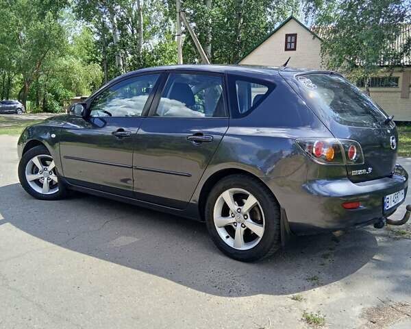 Сірий Мазда 3, об'ємом двигуна 1.56 л та пробігом 247 тис. км за 6700 $, фото 7 на Automoto.ua