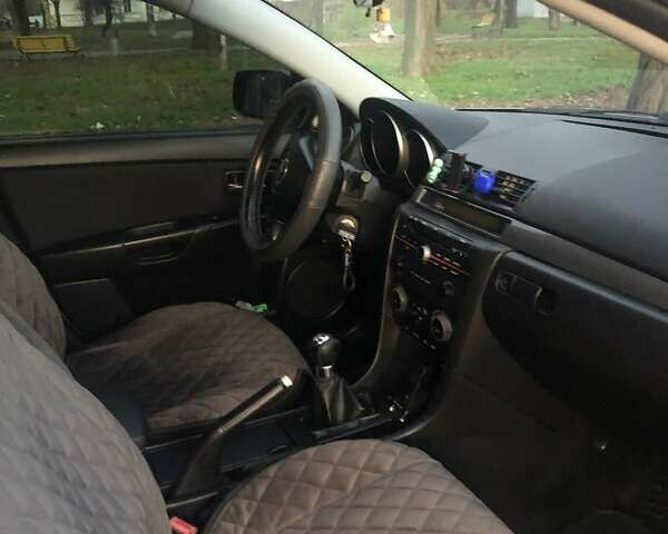 Серый Мазда 3, объемом двигателя 1.56 л и пробегом 179 тыс. км за 5450 $, фото 9 на Automoto.ua