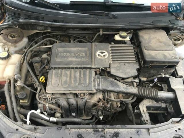 Серый Мазда 3, объемом двигателя 1.6 л и пробегом 212 тыс. км за 3500 $, фото 11 на Automoto.ua