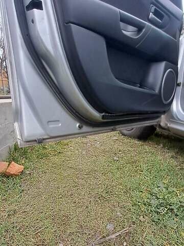 Серый Мазда 3, объемом двигателя 1.6 л и пробегом 370 тыс. км за 2200 $, фото 12 на Automoto.ua