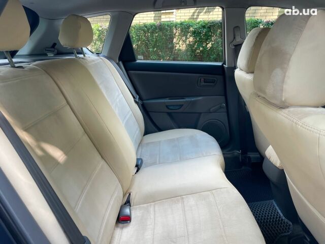 Сірий Мазда 3, об'ємом двигуна 1.4 л та пробігом 305 тис. км за 5340 $, фото 25 на Automoto.ua