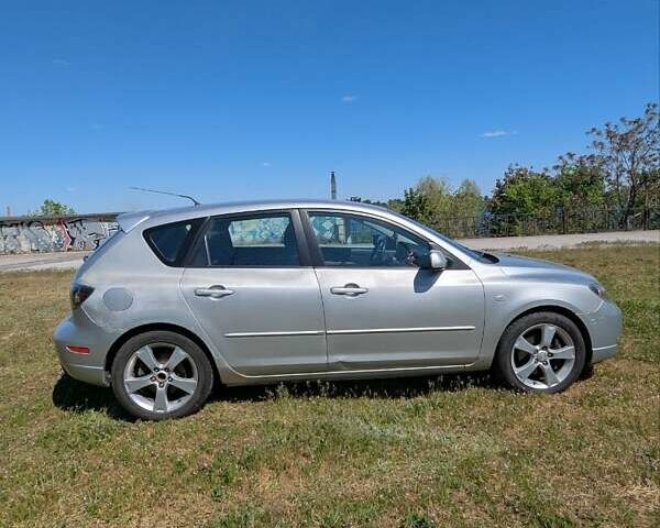 Серый Мазда 3, объемом двигателя 2.3 л и пробегом 202 тыс. км за 4499 $, фото 4 на Automoto.ua