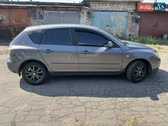 Сірий Мазда 3, об'ємом двигуна 1.6 л та пробігом 233 тис. км за 6000 $, фото 7 на Automoto.ua