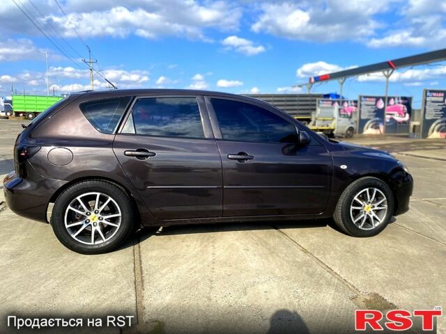 Серый Мазда 3, объемом двигателя 1.6 л и пробегом 282 тыс. км за 6000 $, фото 2 на Automoto.ua