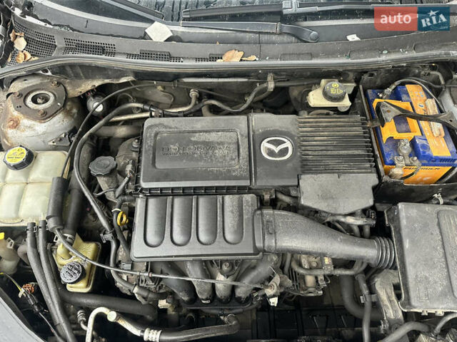 Серый Мазда 3, объемом двигателя 1.6 л и пробегом 200 тыс. км за 1750 $, фото 6 на Automoto.ua