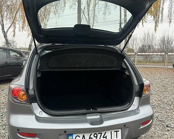 Сірий Мазда 3, об'ємом двигуна 1.6 л та пробігом 216 тис. км за 4800 $, фото 20 на Automoto.ua