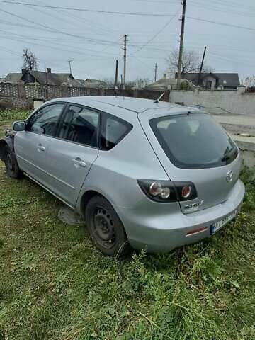 Серый Мазда 3, объемом двигателя 1.6 л и пробегом 370 тыс. км за 2200 $, фото 1 на Automoto.ua