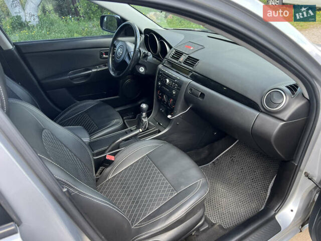 Сірий Мазда 3, об'ємом двигуна 1.6 л та пробігом 232 тис. км за 4200 $, фото 15 на Automoto.ua
