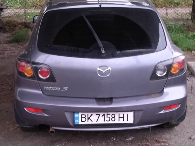 Сірий Мазда 3, об'ємом двигуна 1.6 л та пробігом 300 тис. км за 2700 $, фото 3 на Automoto.ua
