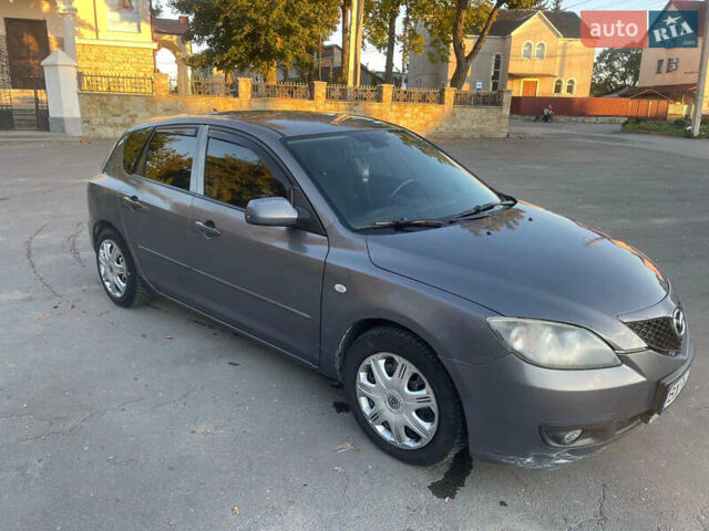Серый Мазда 3, объемом двигателя 2 л и пробегом 300 тыс. км за 6500 $, фото 1 на Automoto.ua