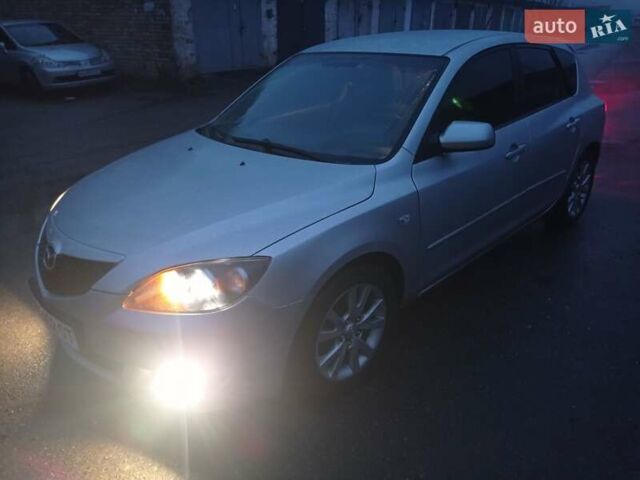 Серый Мазда 3, объемом двигателя 1.6 л и пробегом 140 тыс. км за 3900 $, фото 1 на Automoto.ua