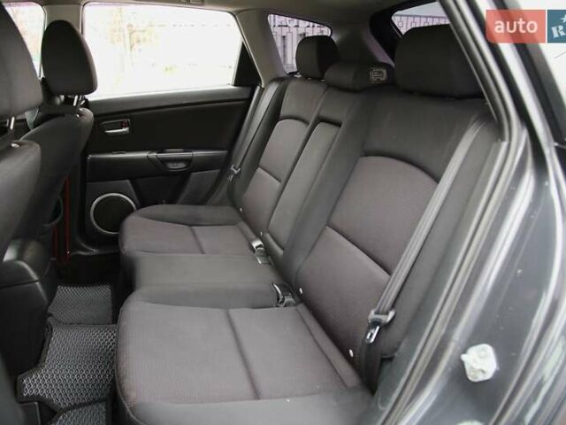 Серый Мазда 3, объемом двигателя 1.6 л и пробегом 247 тыс. км за 4999 $, фото 7 на Automoto.ua