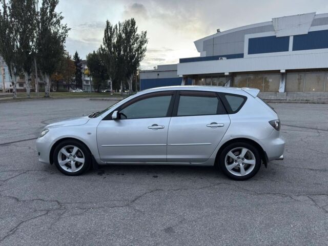 Серый Мазда 3, объемом двигателя 2 л и пробегом 170 тыс. км за 4800 $, фото 5 на Automoto.ua