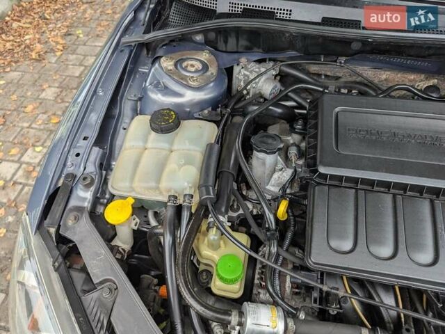 Серый Мазда 3, объемом двигателя 1.6 л и пробегом 217 тыс. км за 5499 $, фото 7 на Automoto.ua