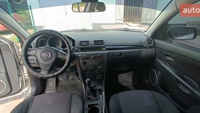 Серый Мазда 3, объемом двигателя 1.6 л и пробегом 230 тыс. км за 4150 $, фото 4 на Automoto.ua