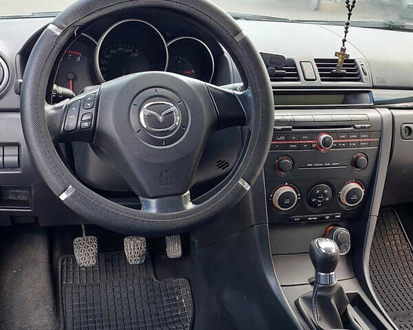 Серый Мазда 3, объемом двигателя 1.6 л и пробегом 211 тыс. км за 4750 $, фото 7 на Automoto.ua