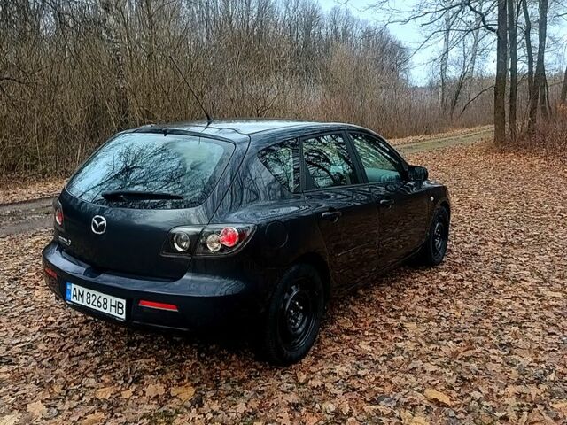 Серый Мазда 3, объемом двигателя 1.6 л и пробегом 228 тыс. км за 4550 $, фото 3 на Automoto.ua