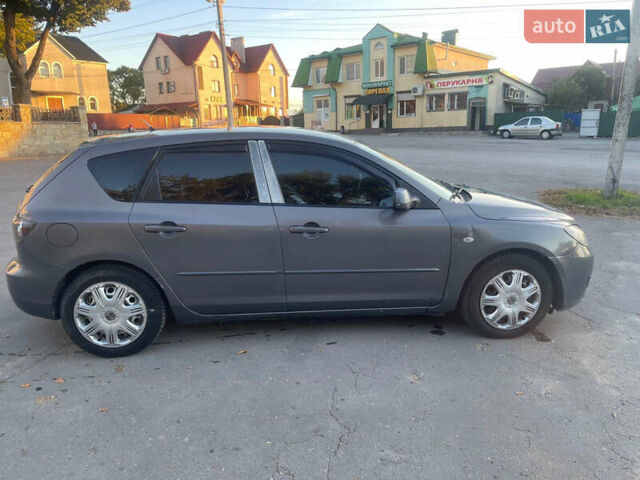 Серый Мазда 3, объемом двигателя 2 л и пробегом 300 тыс. км за 6500 $, фото 5 на Automoto.ua