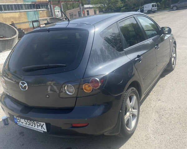 Сірий Мазда 3, об'ємом двигуна 1.6 л та пробігом 291 тис. км за 5300 $, фото 6 на Automoto.ua