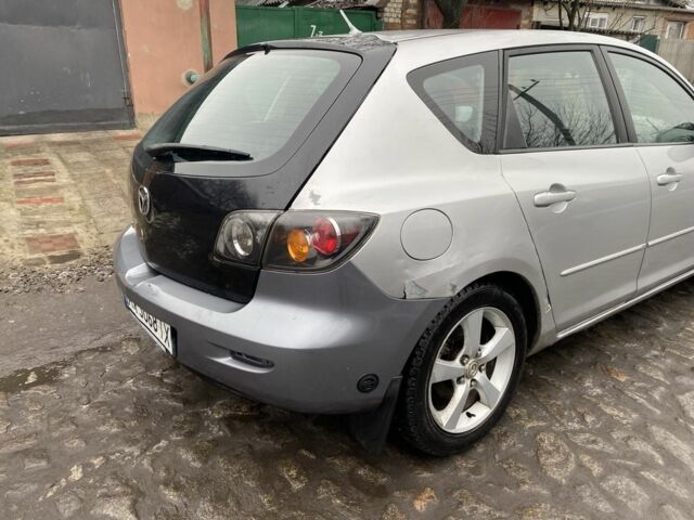 Серый Мазда 3, объемом двигателя 1.6 л и пробегом 227 тыс. км за 2900 $, фото 3 на Automoto.ua
