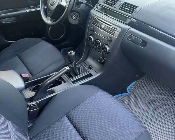 Серый Мазда 3, объемом двигателя 1.6 л и пробегом 275 тыс. км за 5200 $, фото 4 на Automoto.ua