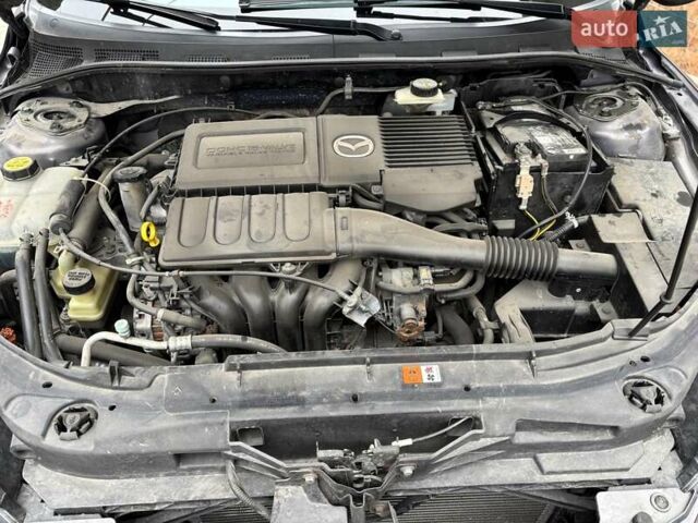 Серый Мазда 3, объемом двигателя 1.6 л и пробегом 905 тыс. км за 5300 $, фото 5 на Automoto.ua