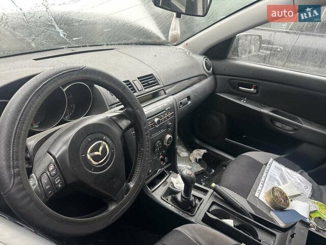 Серый Мазда 3, объемом двигателя 1.6 л и пробегом 200 тыс. км за 1750 $, фото 9 на Automoto.ua