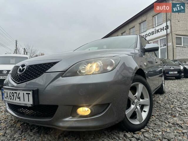 Сірий Мазда 3, об'ємом двигуна 1.6 л та пробігом 216 тис. км за 4800 $, фото 9 на Automoto.ua