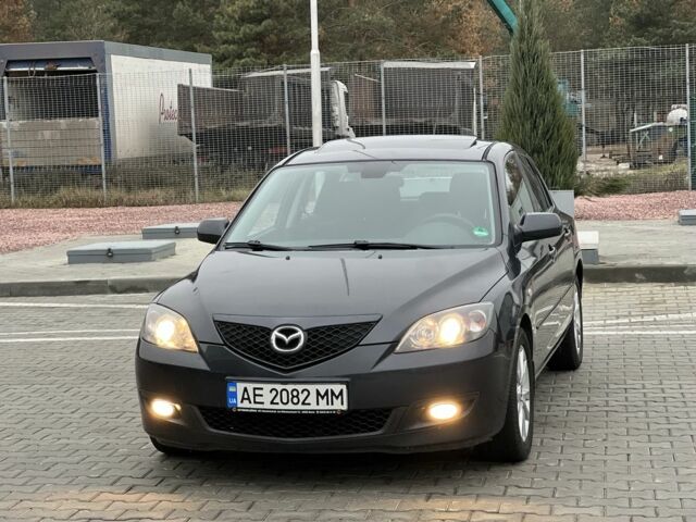 Серый Мазда 3, объемом двигателя 1.6 л и пробегом 250 тыс. км за 4950 $, фото 1 на Automoto.ua