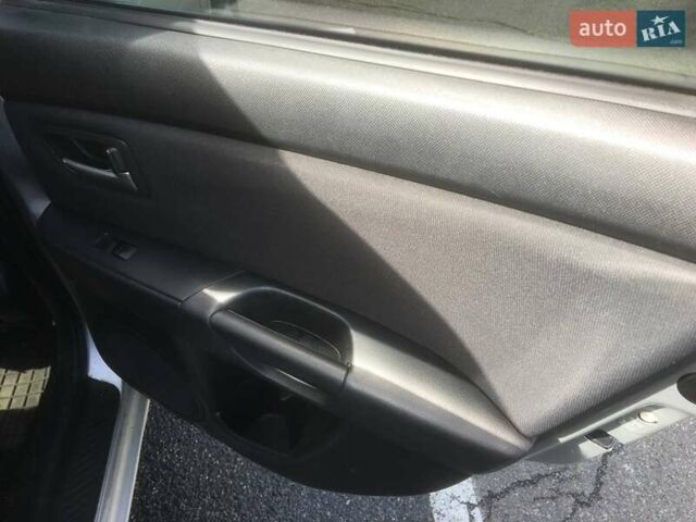 Сірий Мазда 3, об'ємом двигуна 1.6 л та пробігом 251 тис. км за 5300 $, фото 7 на Automoto.ua