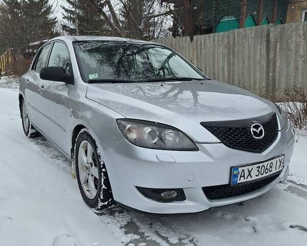 Серый Мазда 3, объемом двигателя 1.6 л и пробегом 228 тыс. км за 4499 $, фото 7 на Automoto.ua