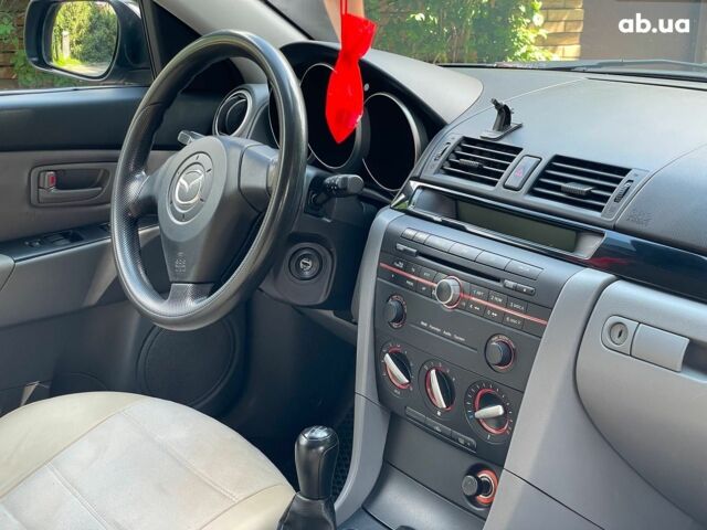 Сірий Мазда 3, об'ємом двигуна 1.4 л та пробігом 305 тис. км за 5340 $, фото 28 на Automoto.ua