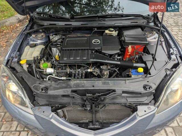 Серый Мазда 3, объемом двигателя 1.6 л и пробегом 217 тыс. км за 5499 $, фото 2 на Automoto.ua