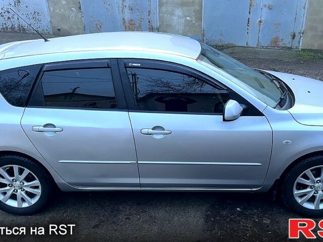 Серый Мазда 3, объемом двигателя 1.6 л и пробегом 31000 тыс. км за 5400 $, фото 11 на Automoto.ua