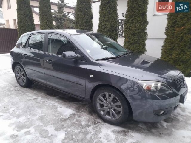 Сірий Мазда 3, об'ємом двигуна 1.56 л та пробігом 246 тис. км за 4200 $, фото 3 на Automoto.ua