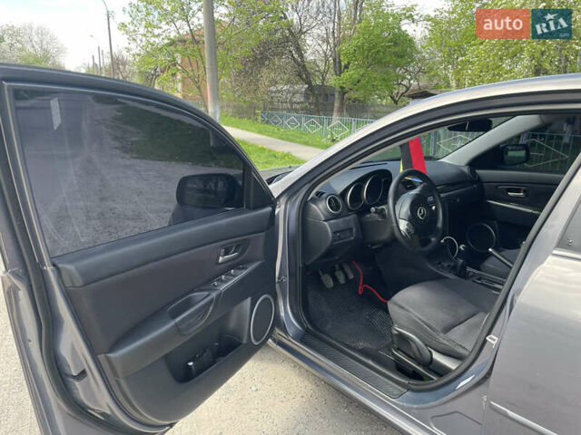 Сірий Мазда 3, об'ємом двигуна 1.6 л та пробігом 237 тис. км за 4900 $, фото 6 на Automoto.ua