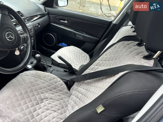 Серый Мазда 3, объемом двигателя 1.6 л и пробегом 905 тыс. км за 5300 $, фото 3 на Automoto.ua