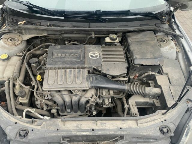 Серый Мазда 3, объемом двигателя 1.6 л и пробегом 196 тыс. км за 4500 $, фото 18 на Automoto.ua